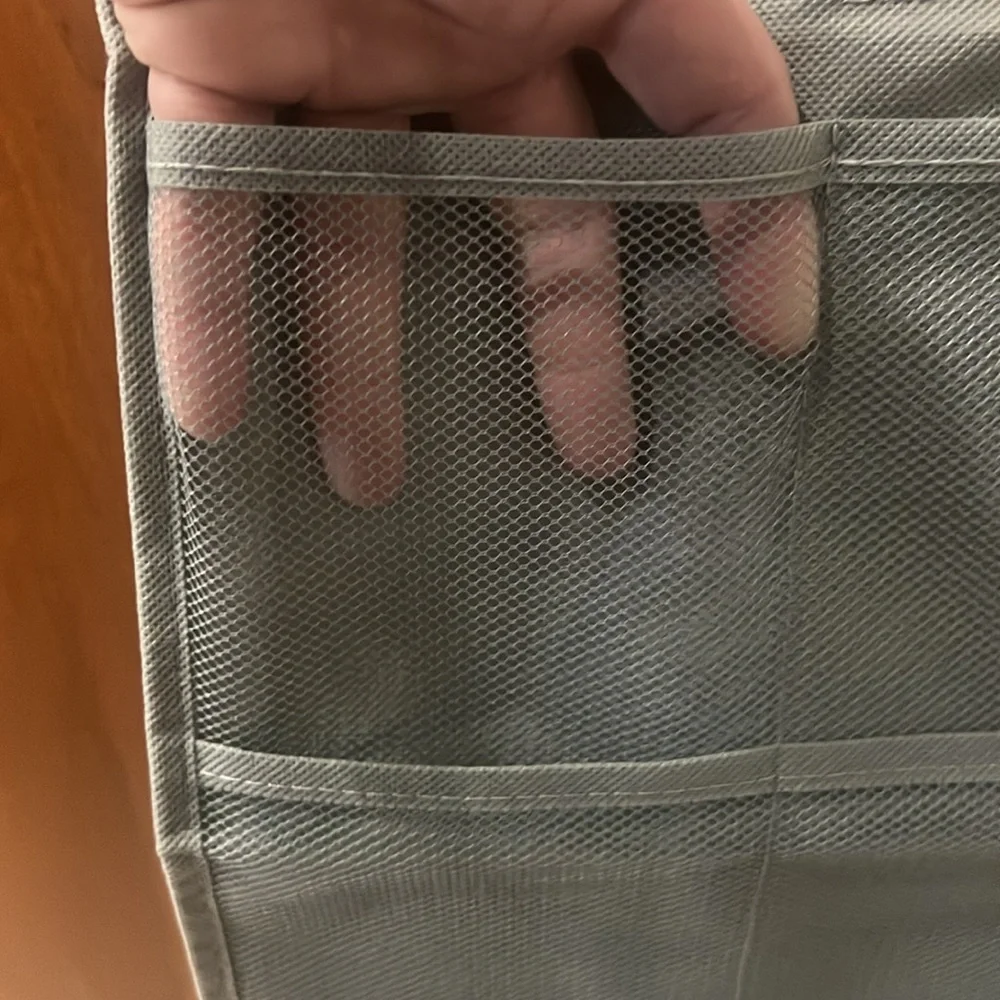 Gray Hanging organizer for closet.